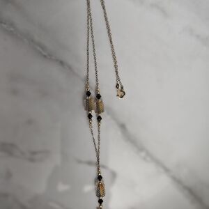 Elegant Gold and Black Necklace